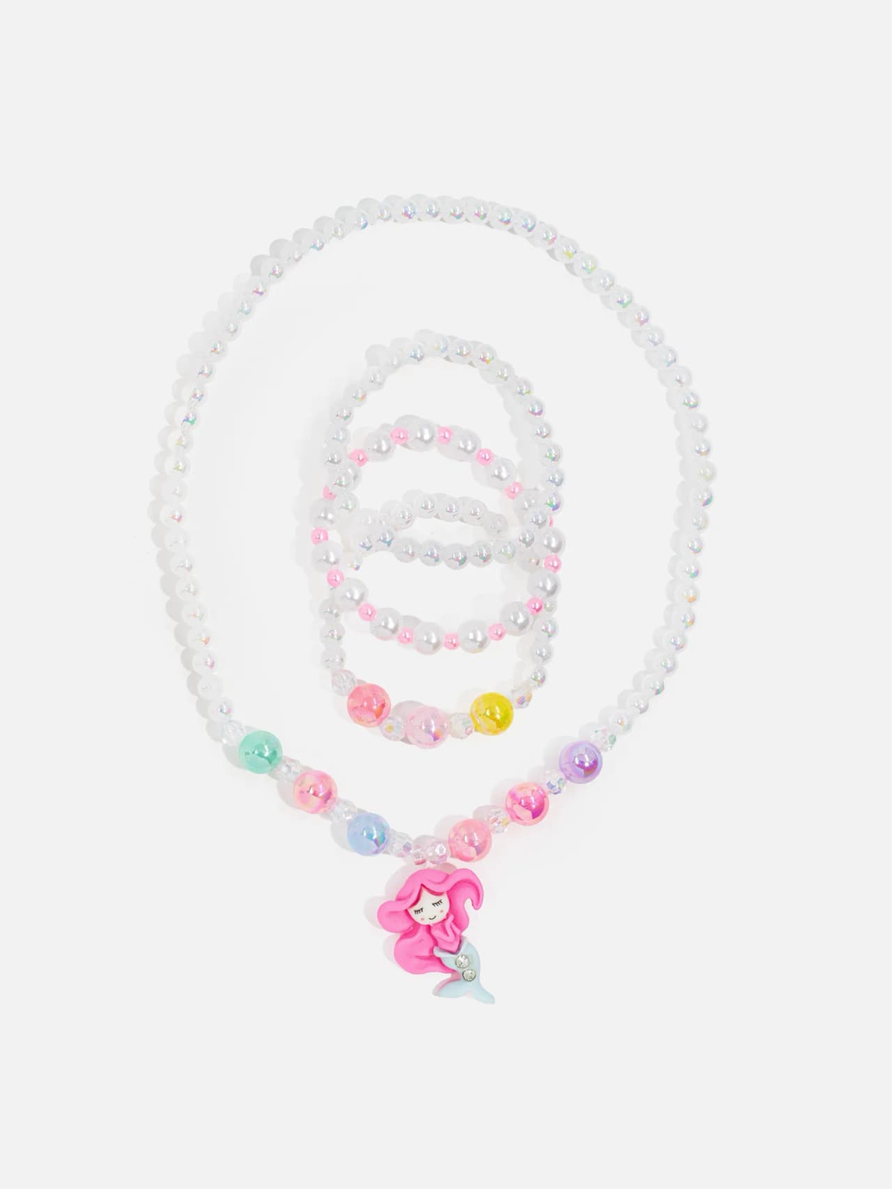 Barnsmyckeset med vitt pärlhalsband, tre armband och rosa sjöjungfruhänge
