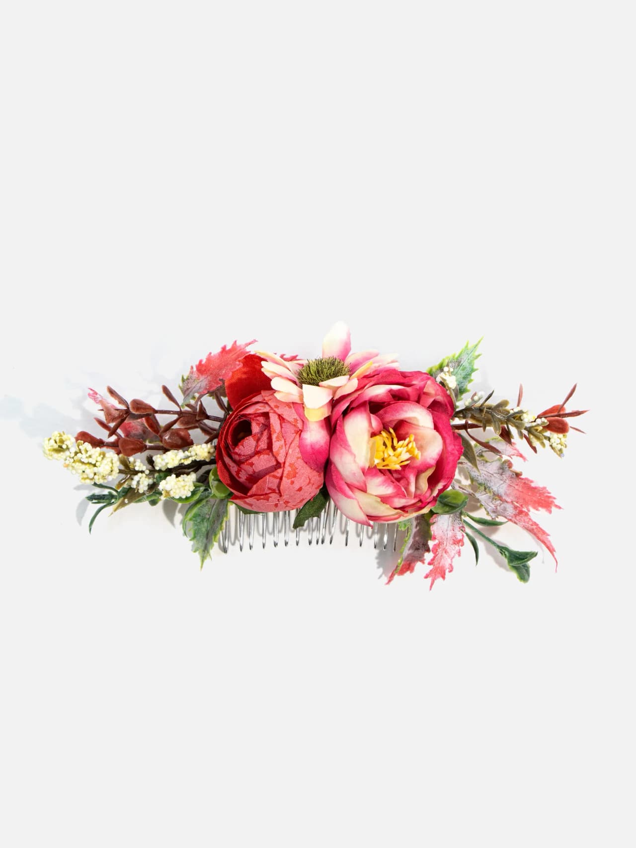 Blommig hårkam med rosa och röda blommor, gröna blad och silverfärgad metallkam