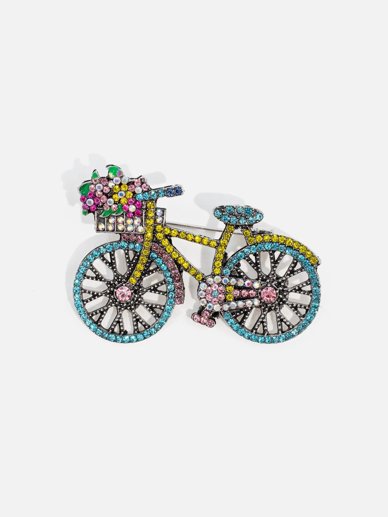 Färgglad brosch i form av en cykel med glittrande detaljer