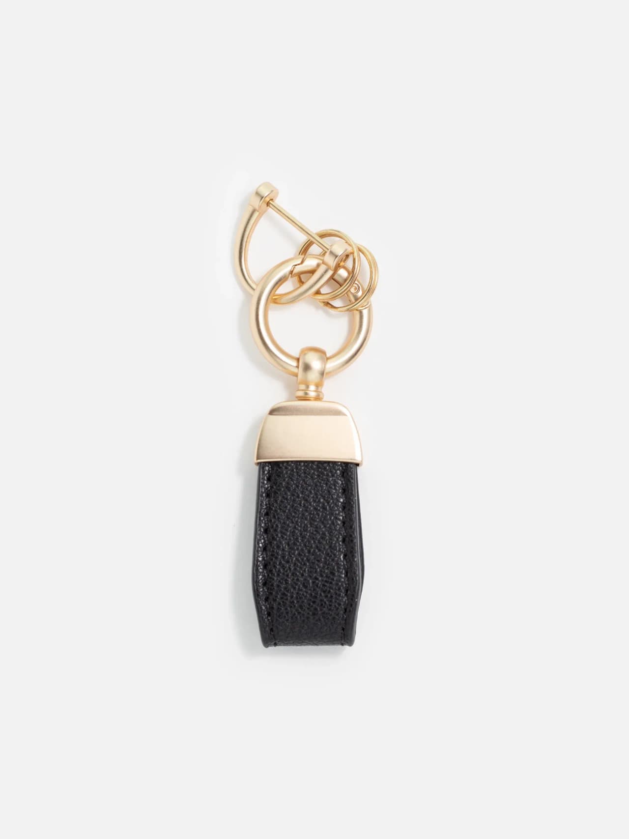 Elegant Nyckelring i Svart och Guld