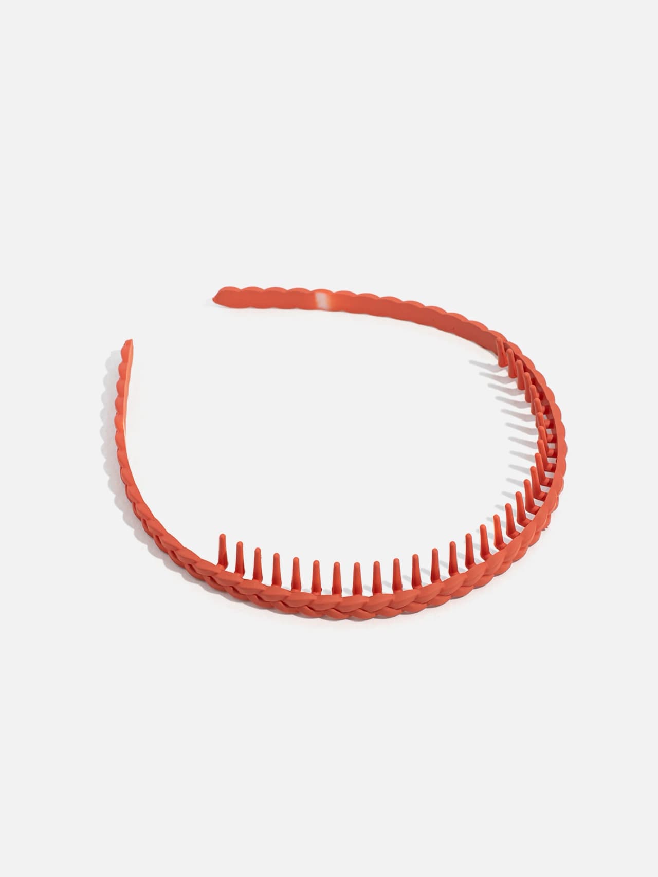 Flätat diadem med kamtänder i orange