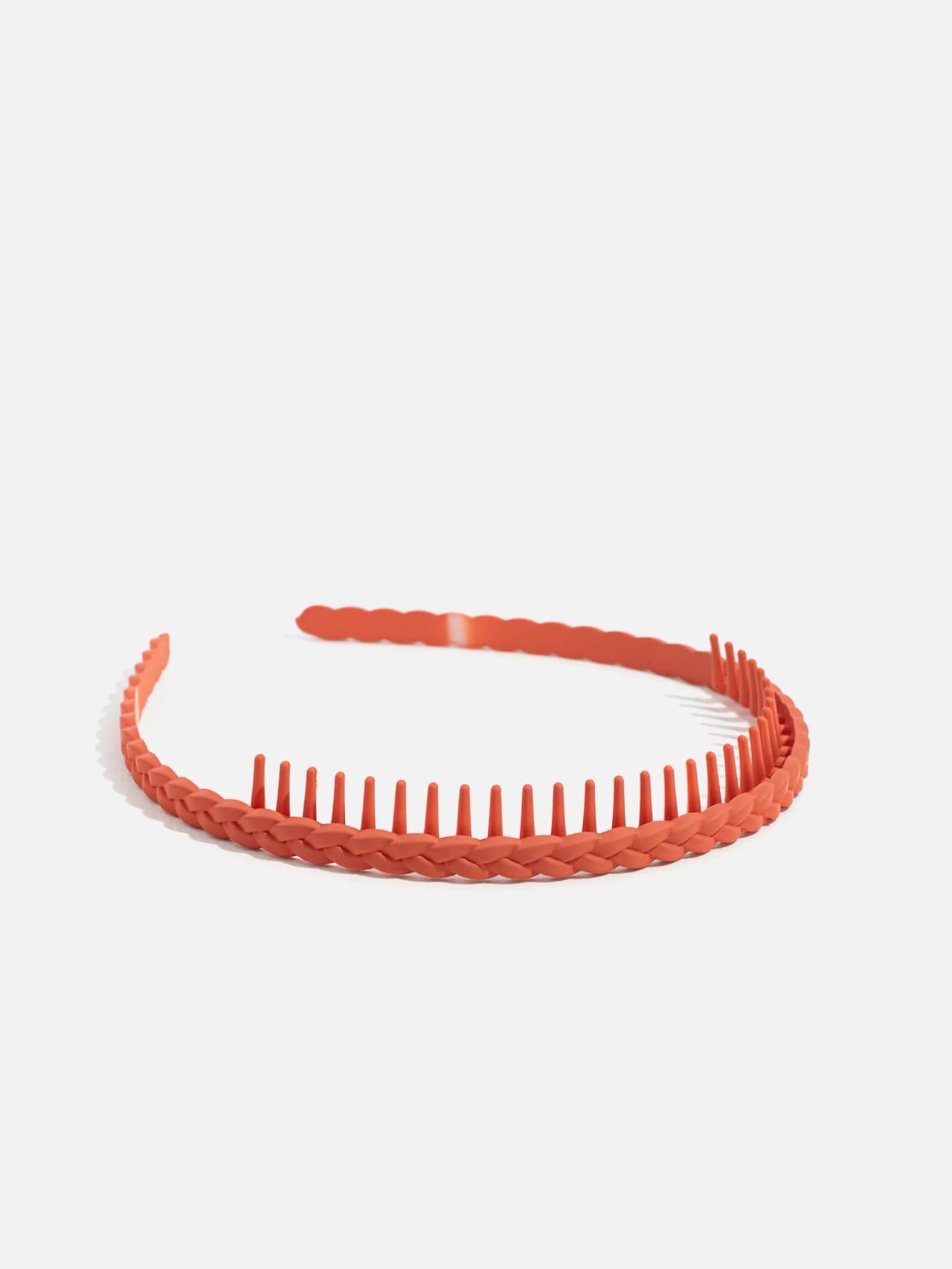 Flätat diadem med kamtänder i orange