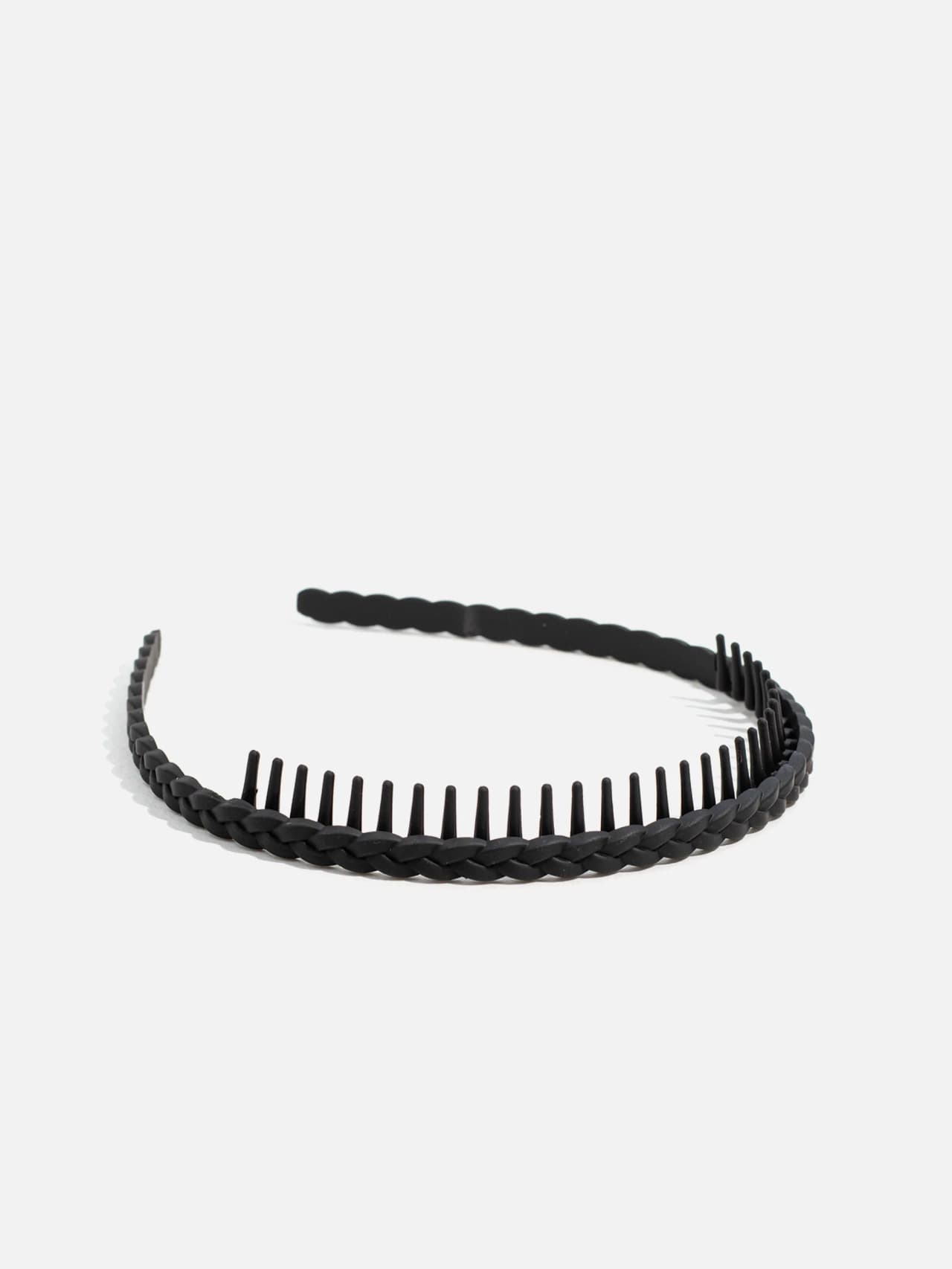 Flätat diadem med kamtänder i svart