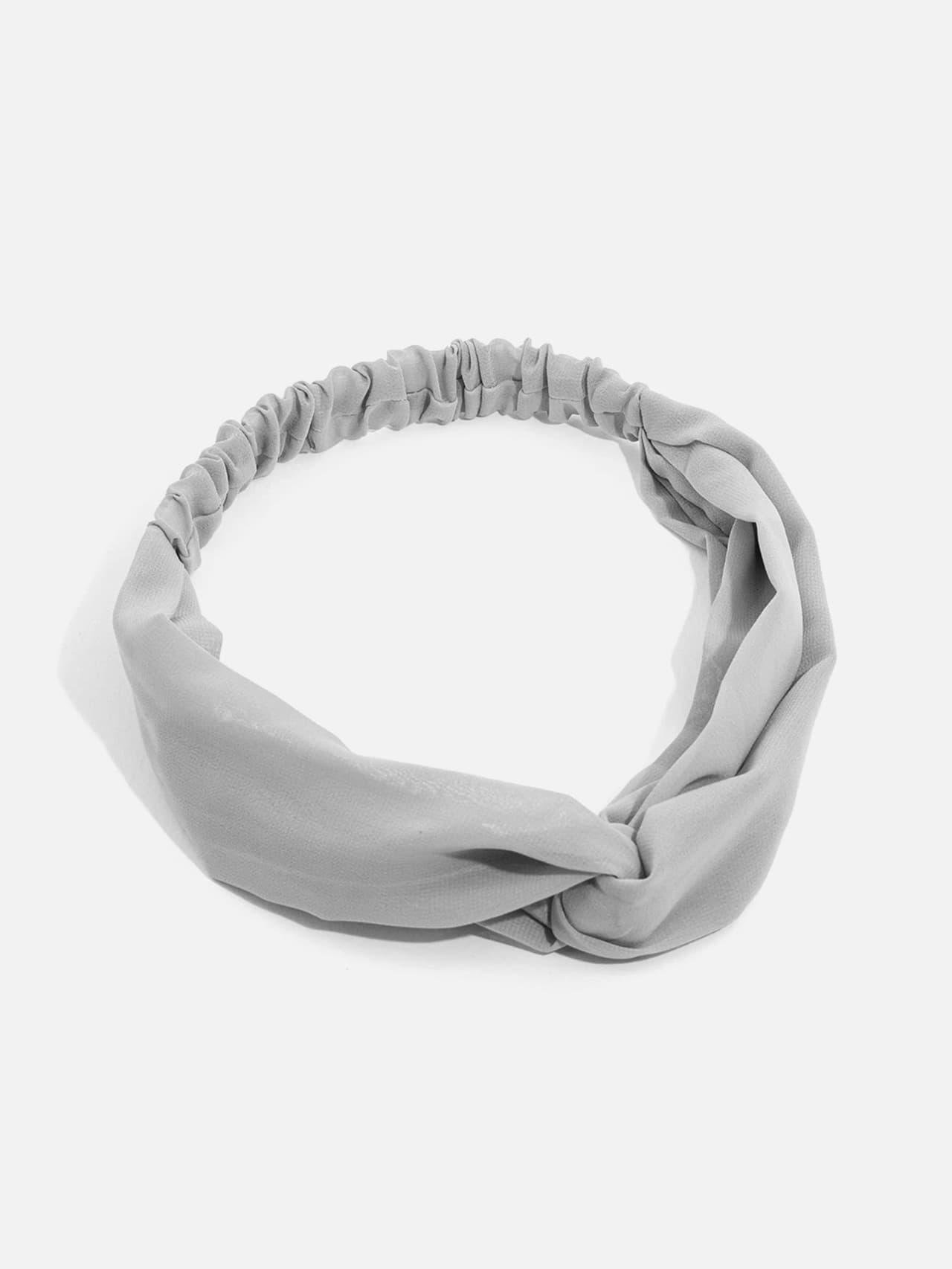 Knutat hårband i enfärgad ljusgrå polyester för dam