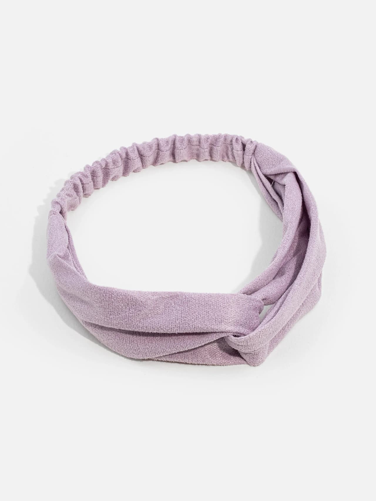 Knutat hårband i enfärgad lila/malva polyester för dam