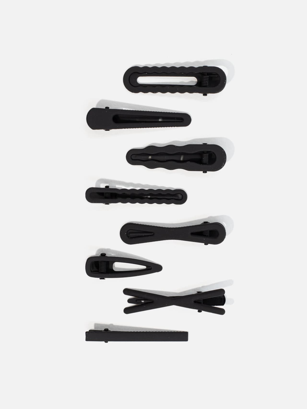 Svart hårspänne set i metall 8pack