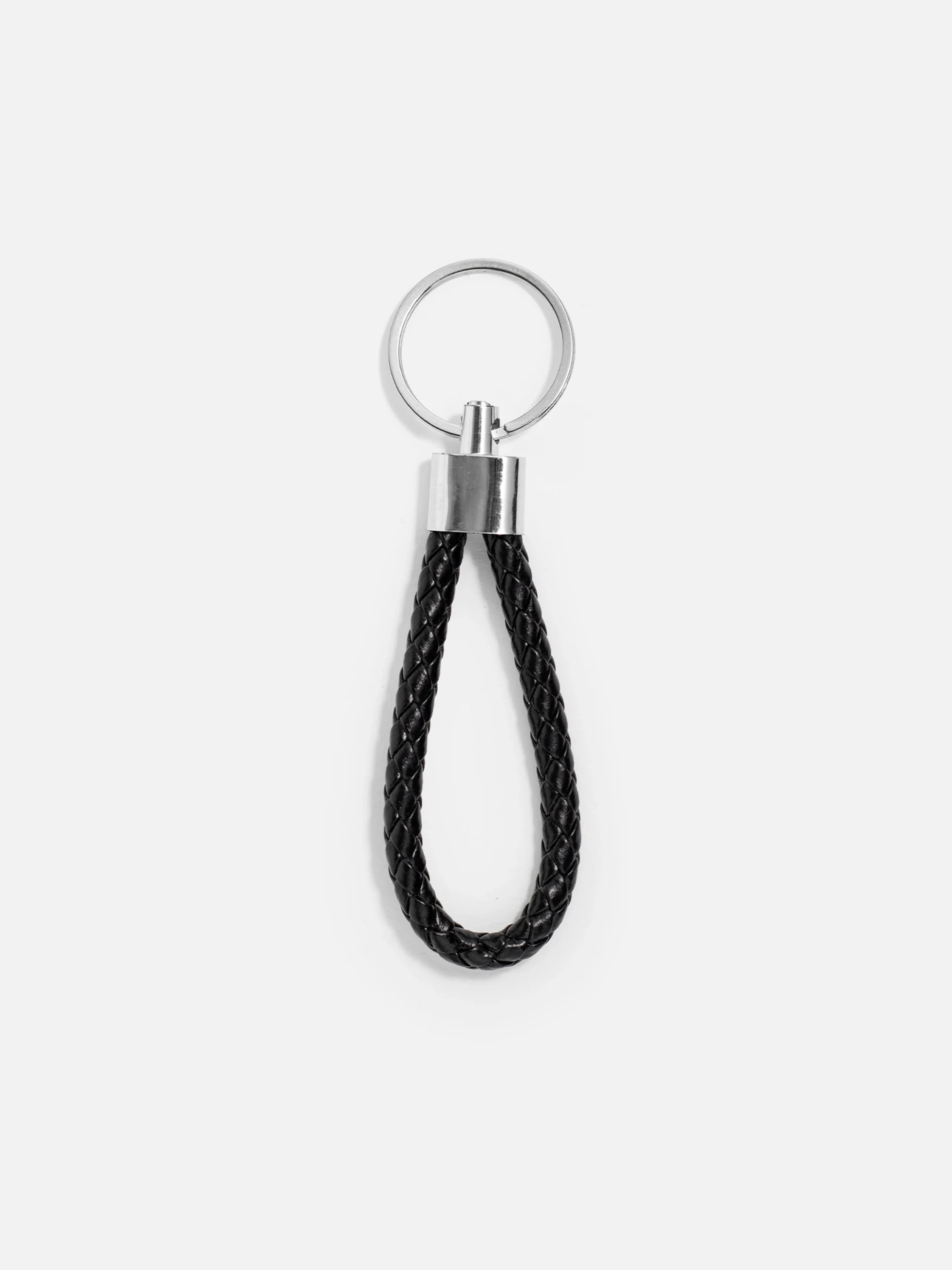 Svart flätad nyckelring i hållbar design för nycklar.
