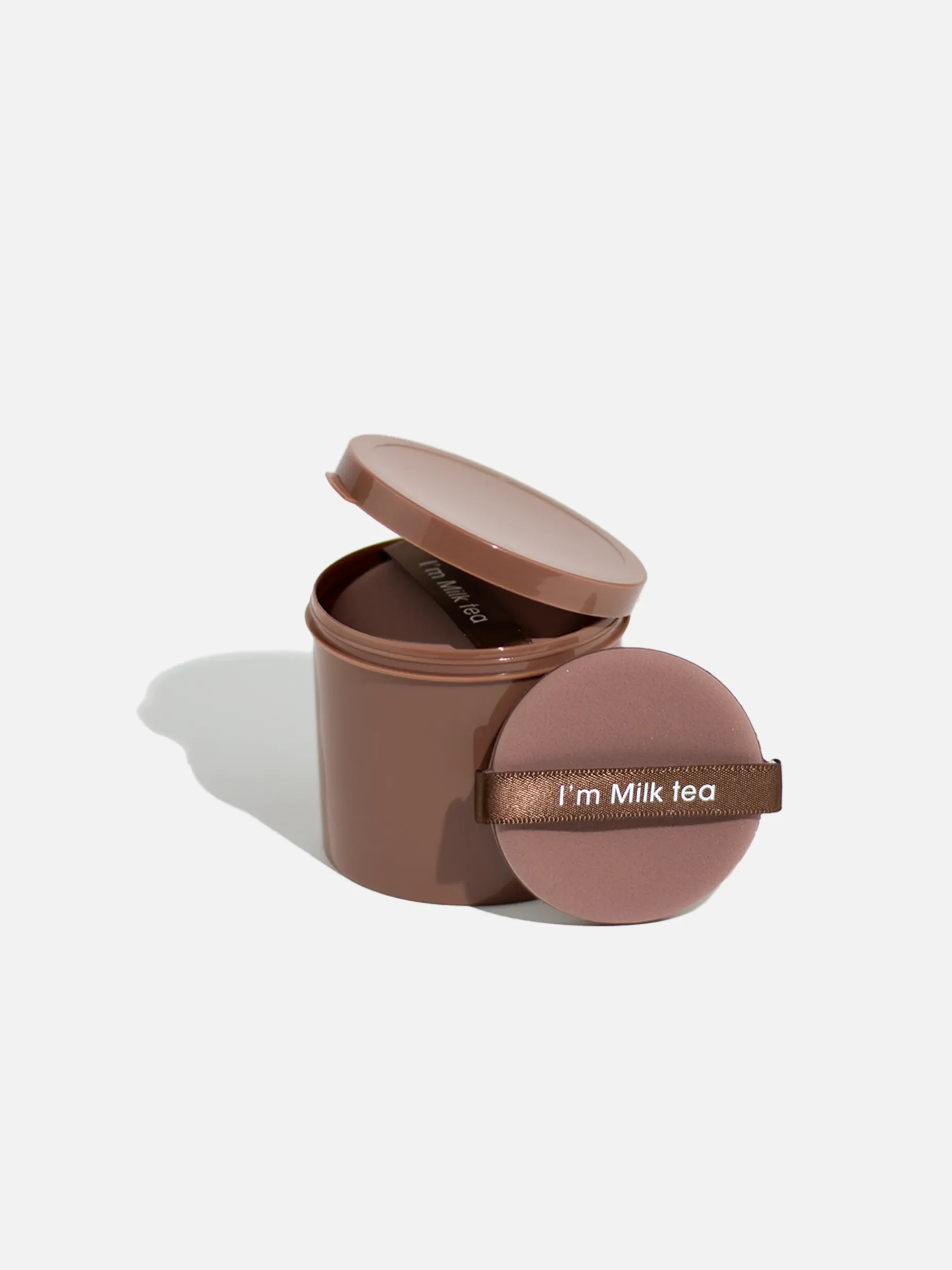 Brun powder puff 7-pack för makeupapplikation.