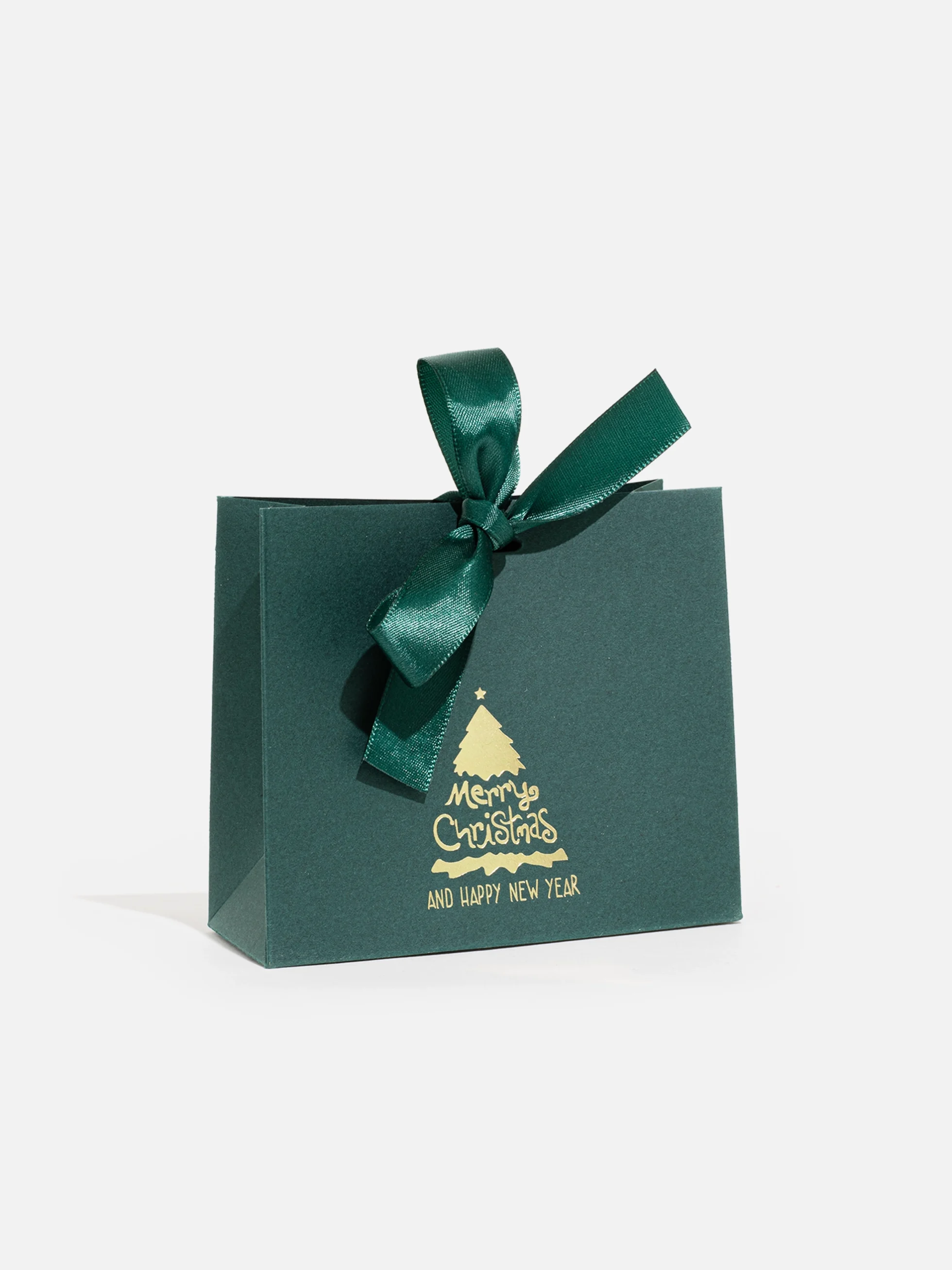 Små Jul Presentask i grönt med "Merry Christmas"-text och grön rosett, perfekt för små gåvor som smycken.