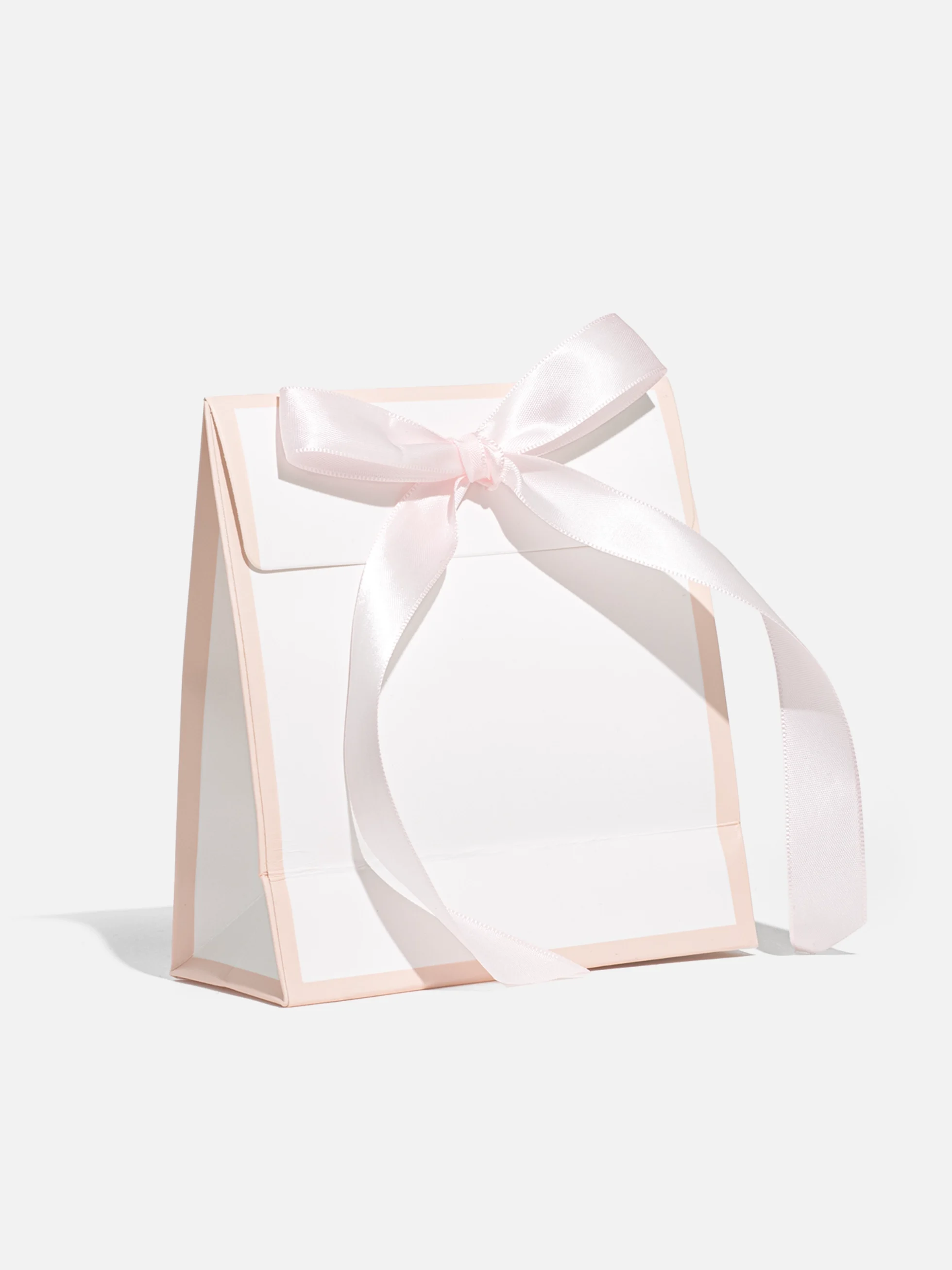 Rosa Presentask med matchande rosett, perfekt för mindre gåvor som smycken och accessoarer.