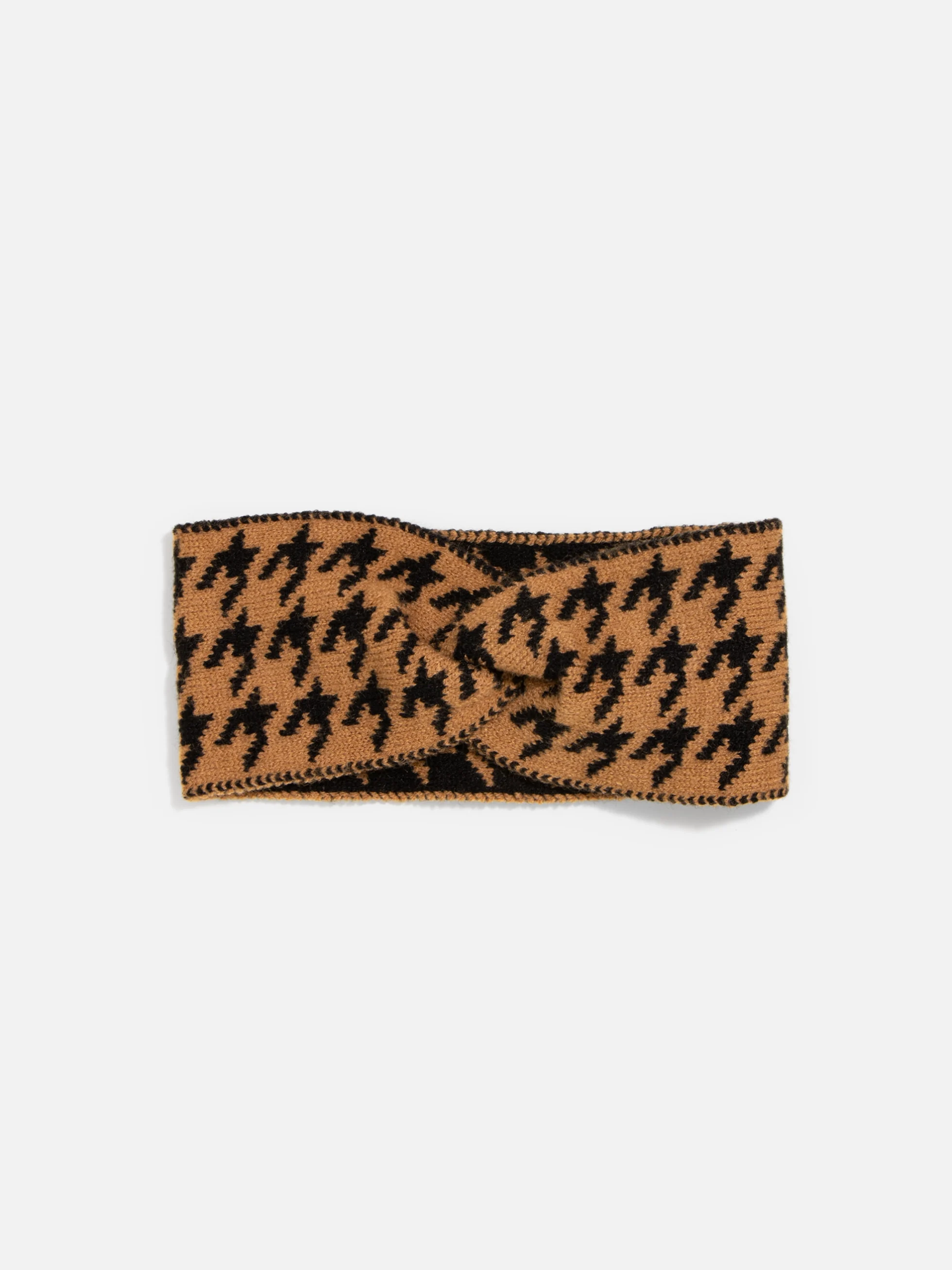 Stickat pannband dam i mjuk design för vinter och höst, värmer öron och panna under kalla dagar. Perfekt för utomhusaktiviteter.