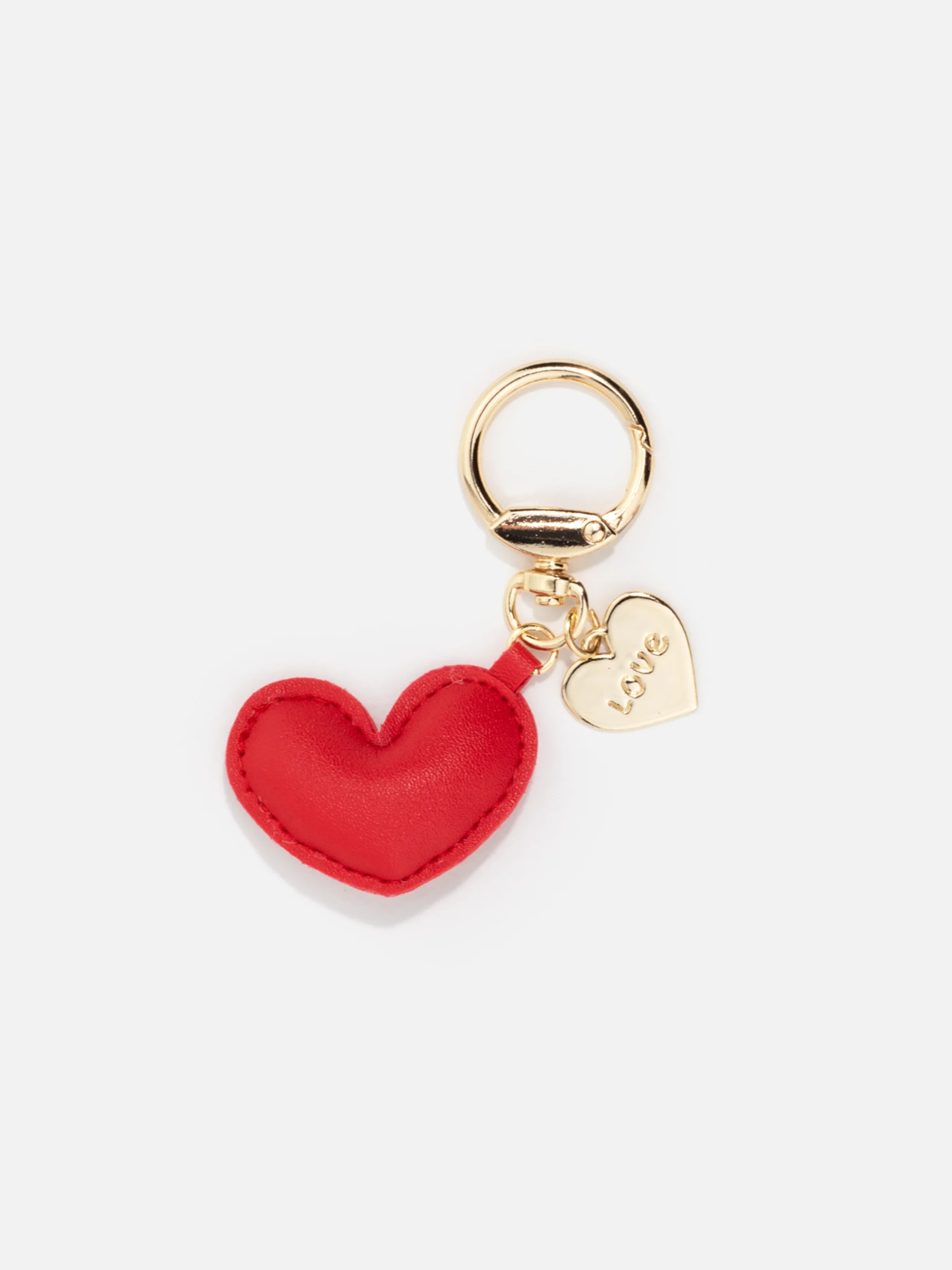 Romantisk hjärtformad nyckelring med "Love"-text – perfekt som present.