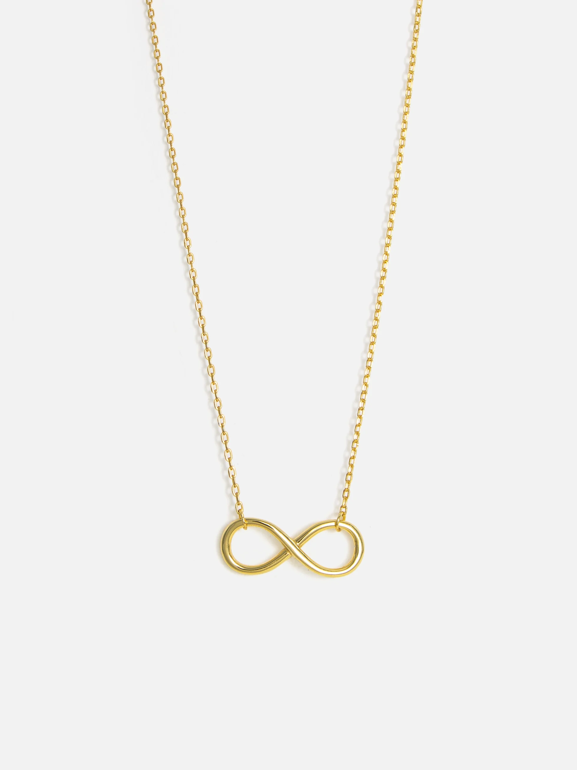 Guldpläterat halsband med infinity-design, symboliskt smycke